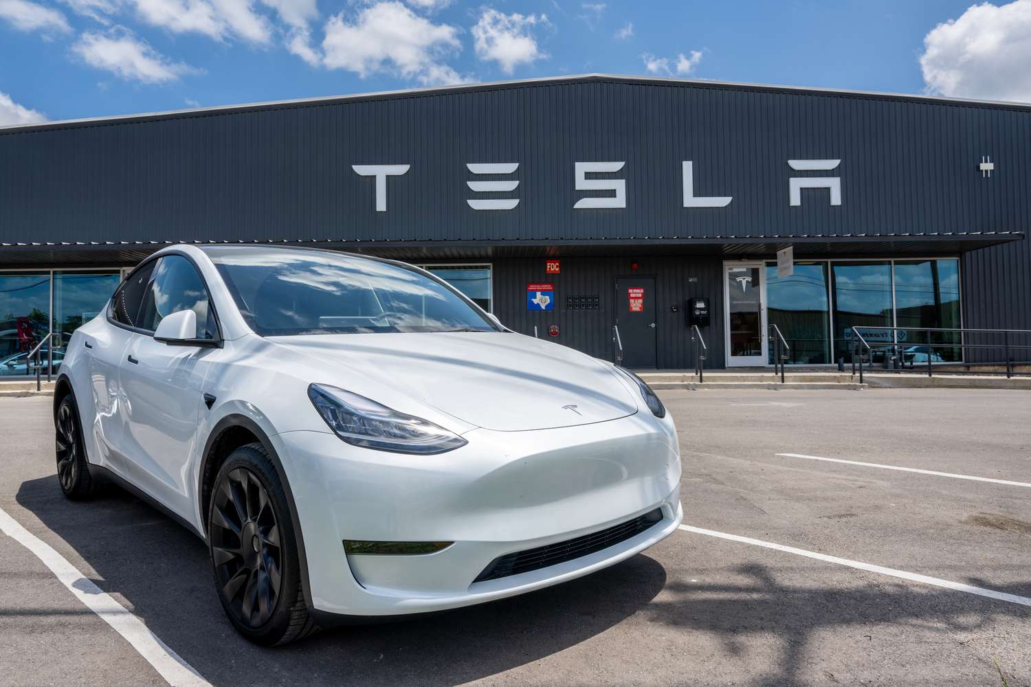 US Stocks Are Going Down; Tesla Deliveries Are Slowing Down, and Fewer People Think Rates Will Be Cut